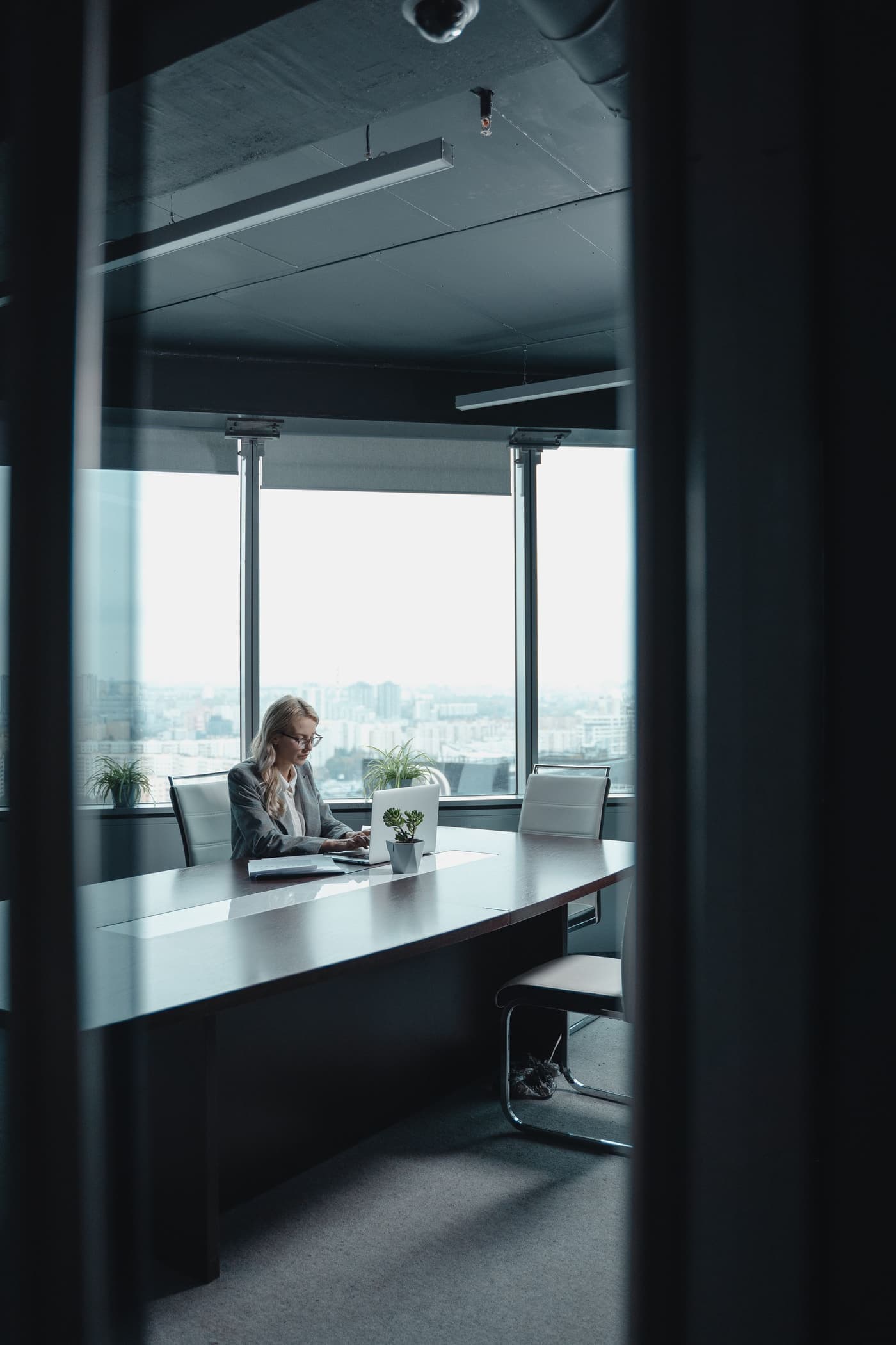 A professional working at a desk in a modern office